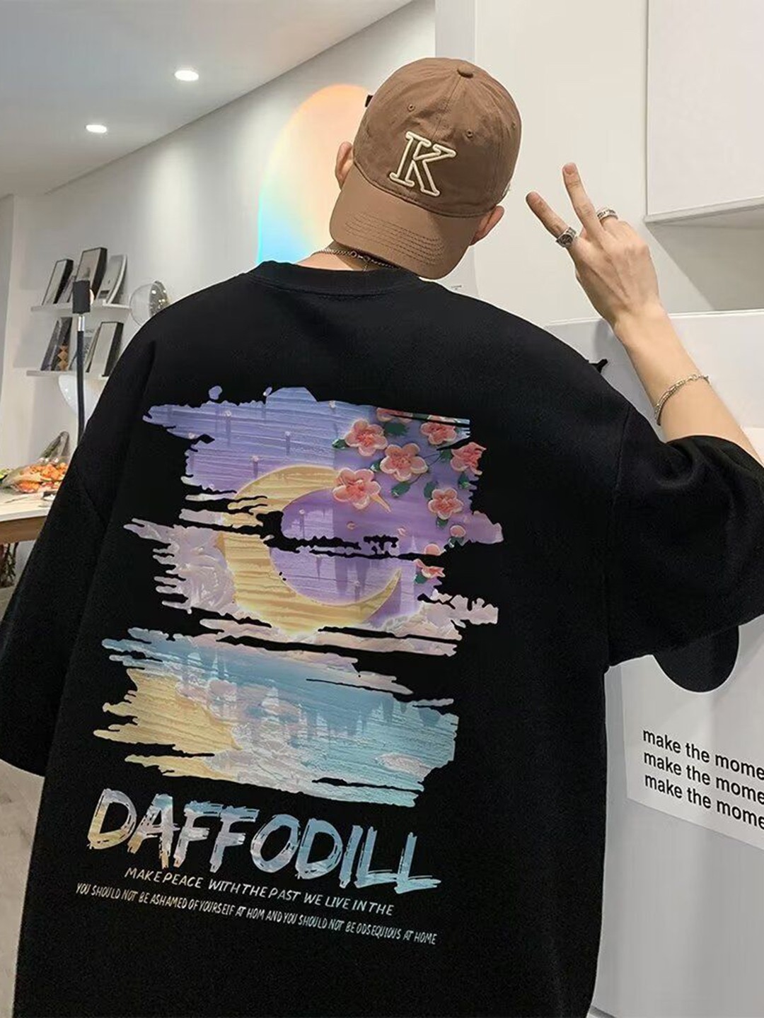 

HERE&NOW Men Graphic Printed Round Neck Cotton Oversized T-shirt, Black