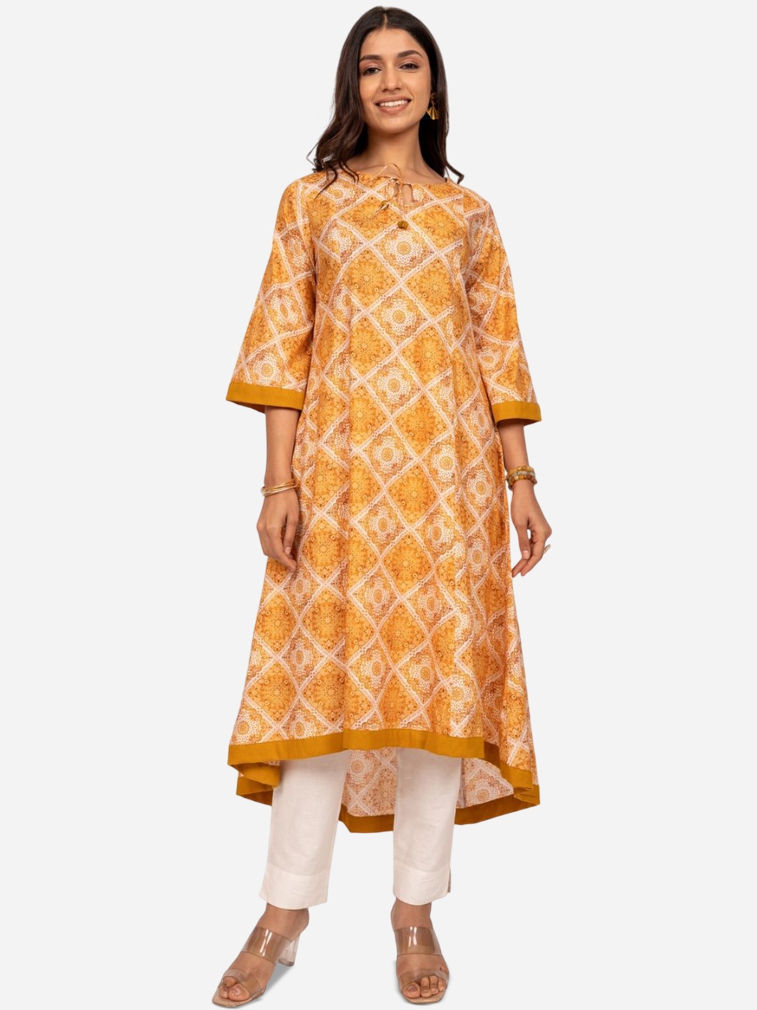 

INDIE JHOLA Ethnic Motifs Printed Tie-Up Neck Panelled Cotton A-Line Kurta, Mustard