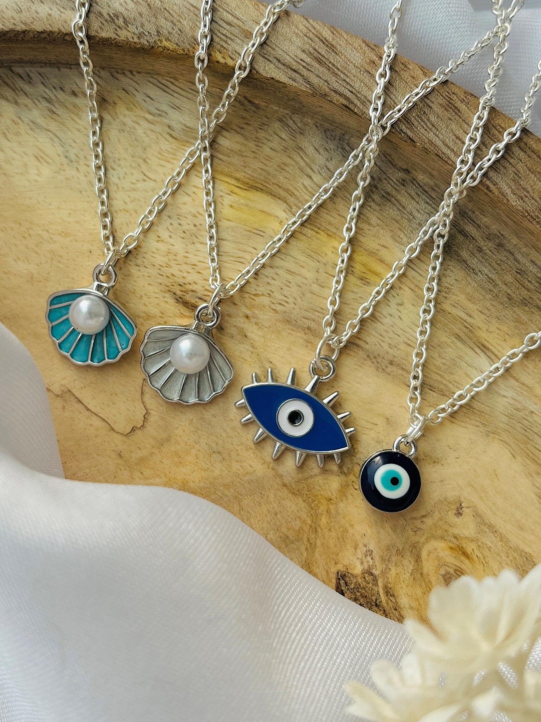 

Jewelsbysirani Korean Set Of 4 Silver-Plated Artificial Stones Studded and Beaded Pendants
