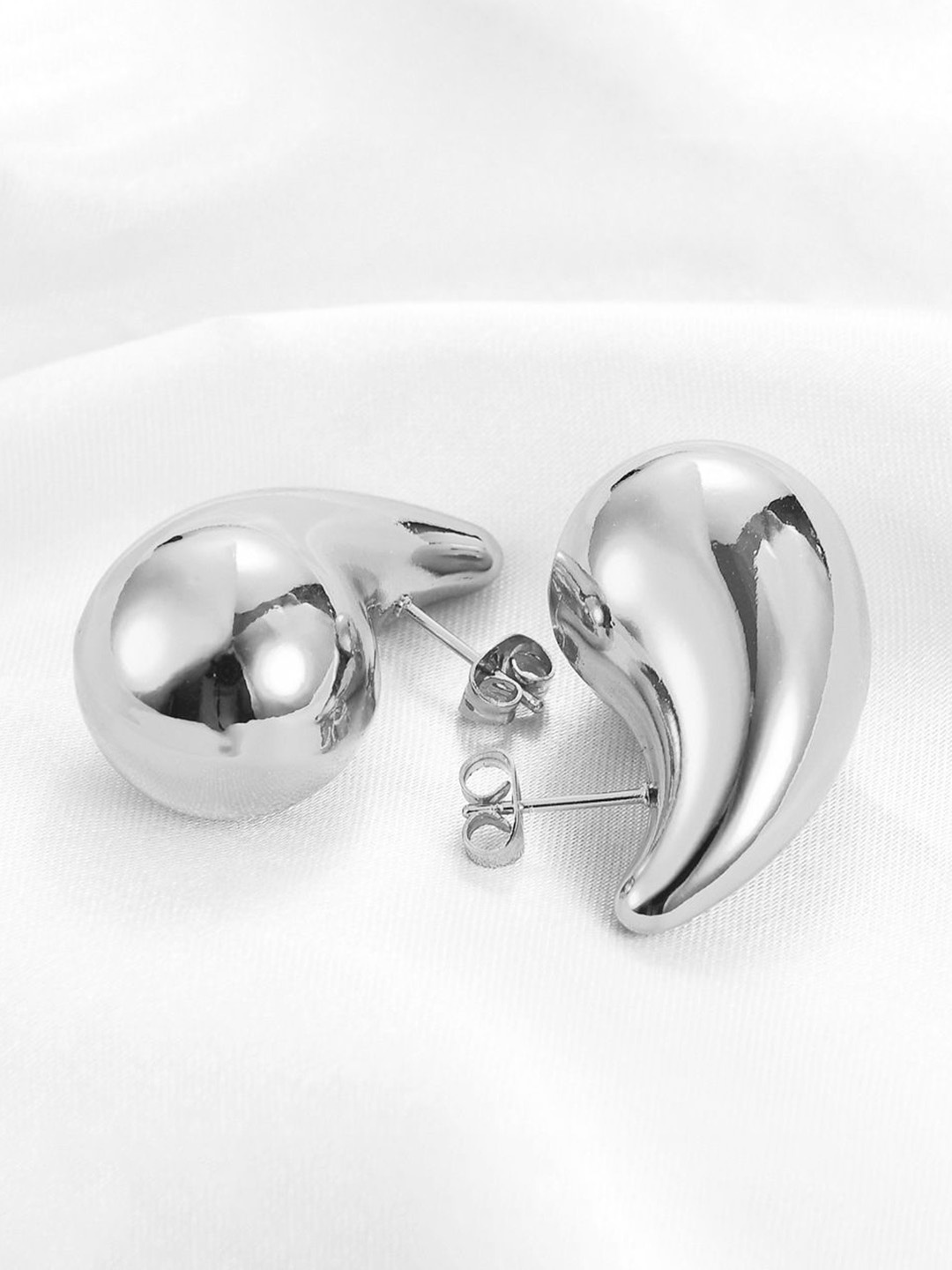

Celestique Silver-Plated Teardrop Shaped Drop Earrings