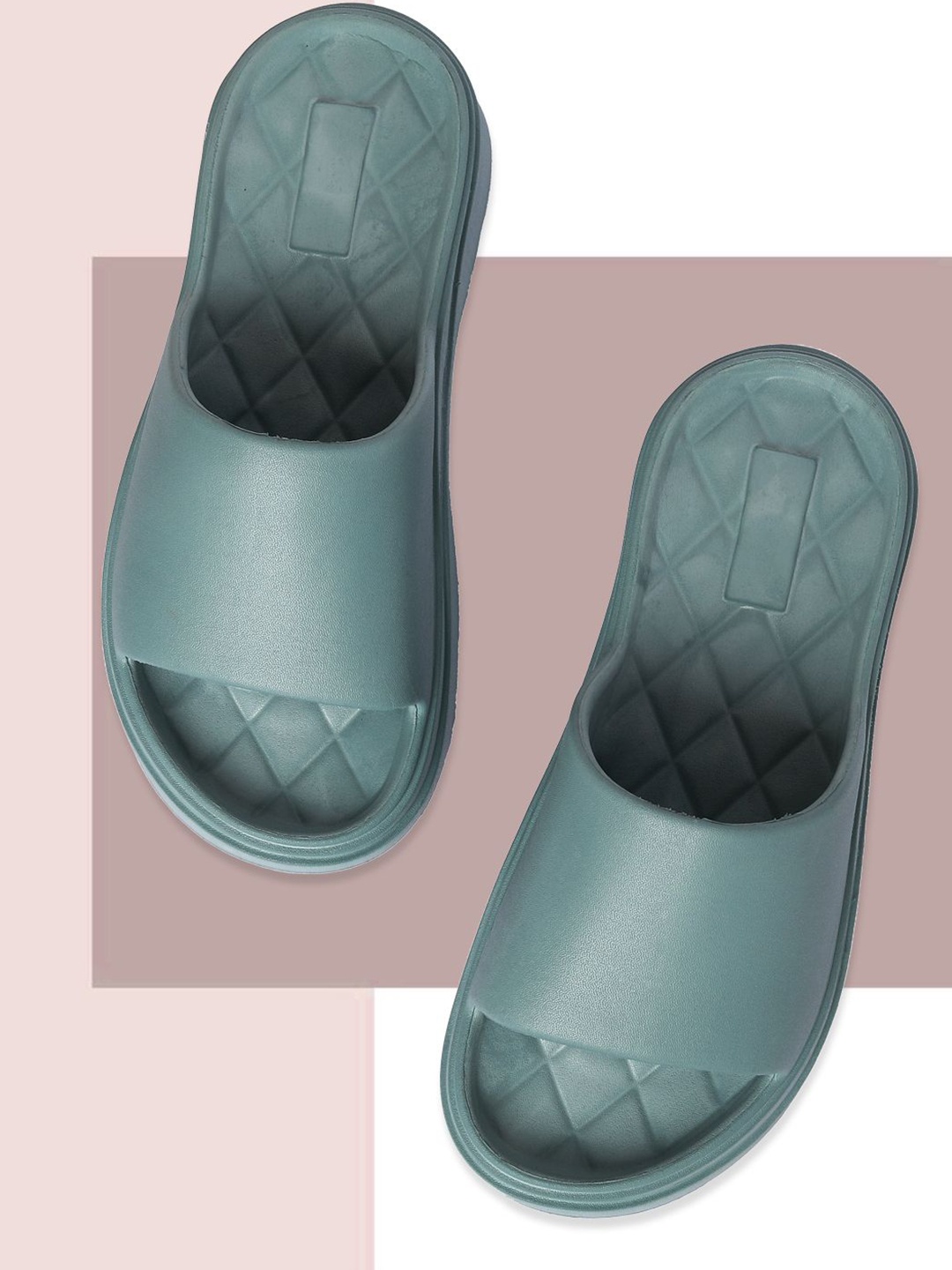 

The Roadster Lifestyle Co Women Round Toe Sliders, Teal