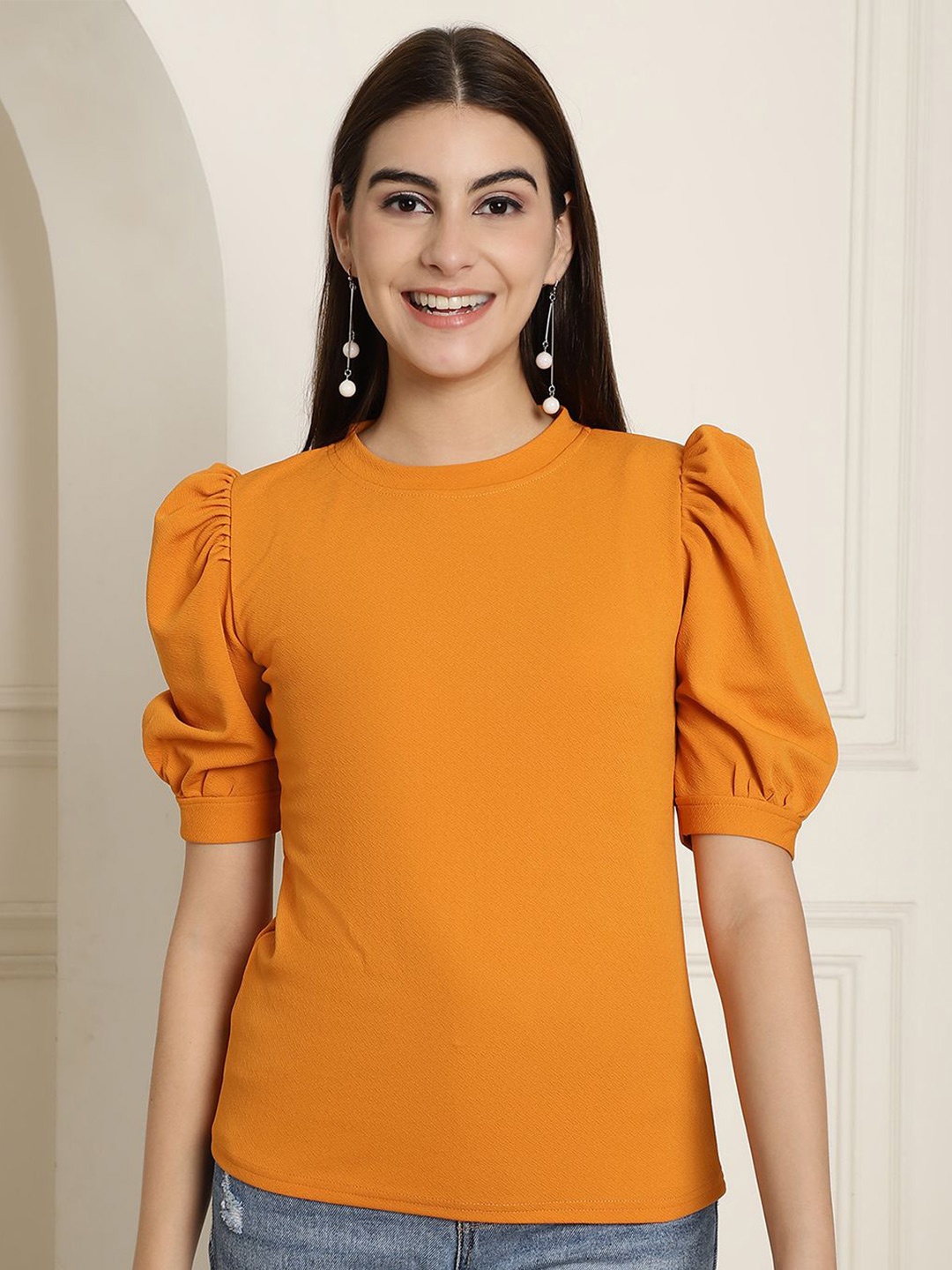 

Tromko Women Solid Round Neck Top, Yellow