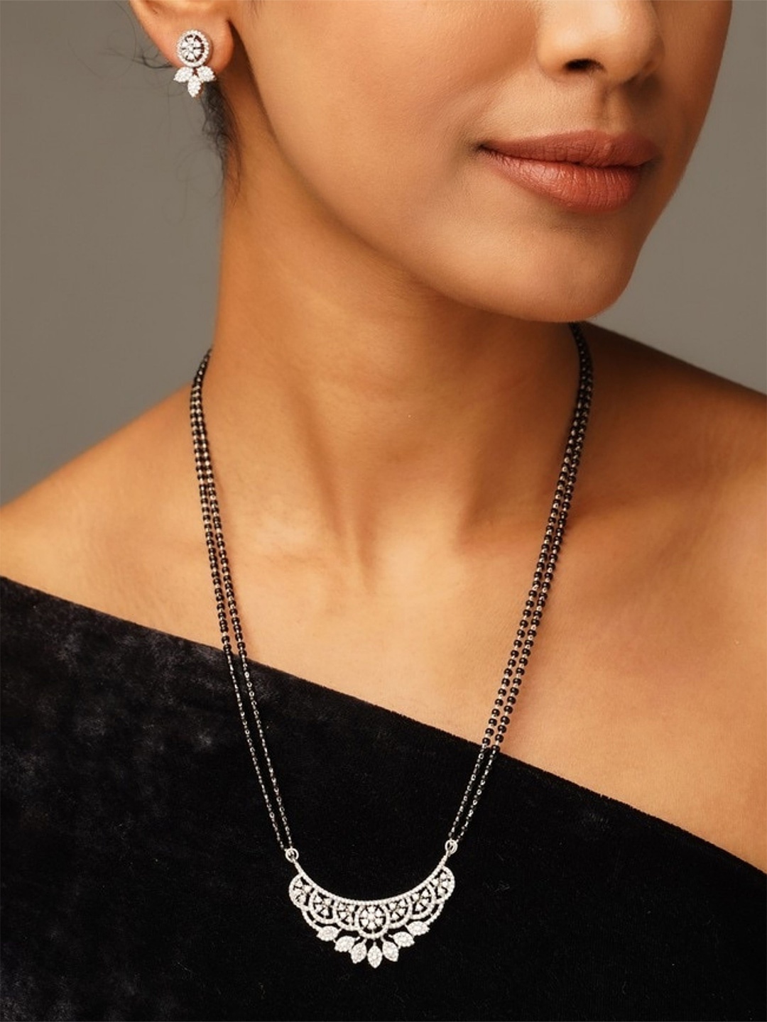 

ABDESIGNS Silver Plated American Diamond Studded & Beaded Mangalsutra Set