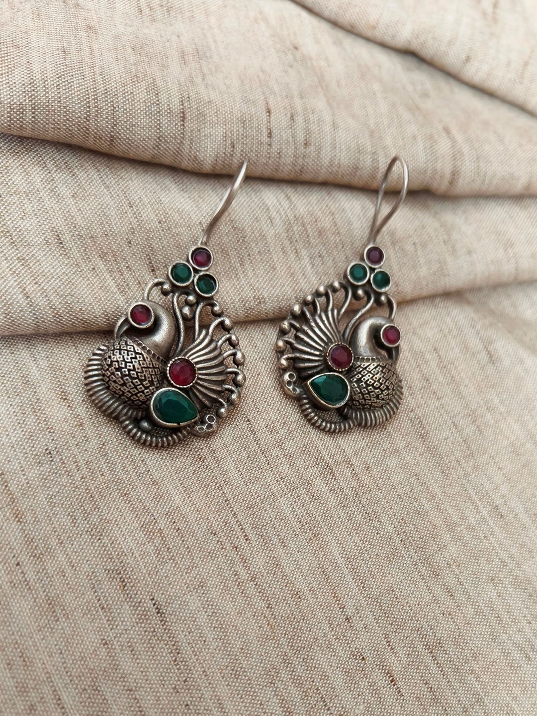 

Molcha Artificial Stones Studded Peacock Shaped Oxidised Drop Earrings, Silver