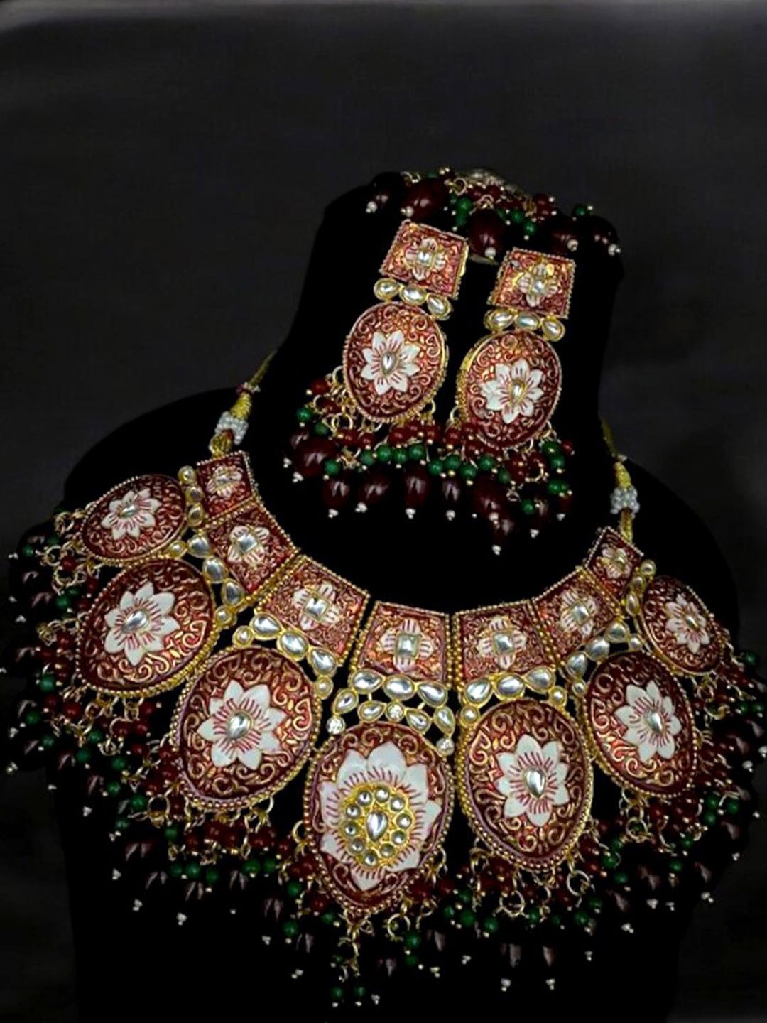 

TISHUL JEWELS Gold-Plated Artificial Stones Studded And Beaded Meenakari Jewellery Set, Maroon