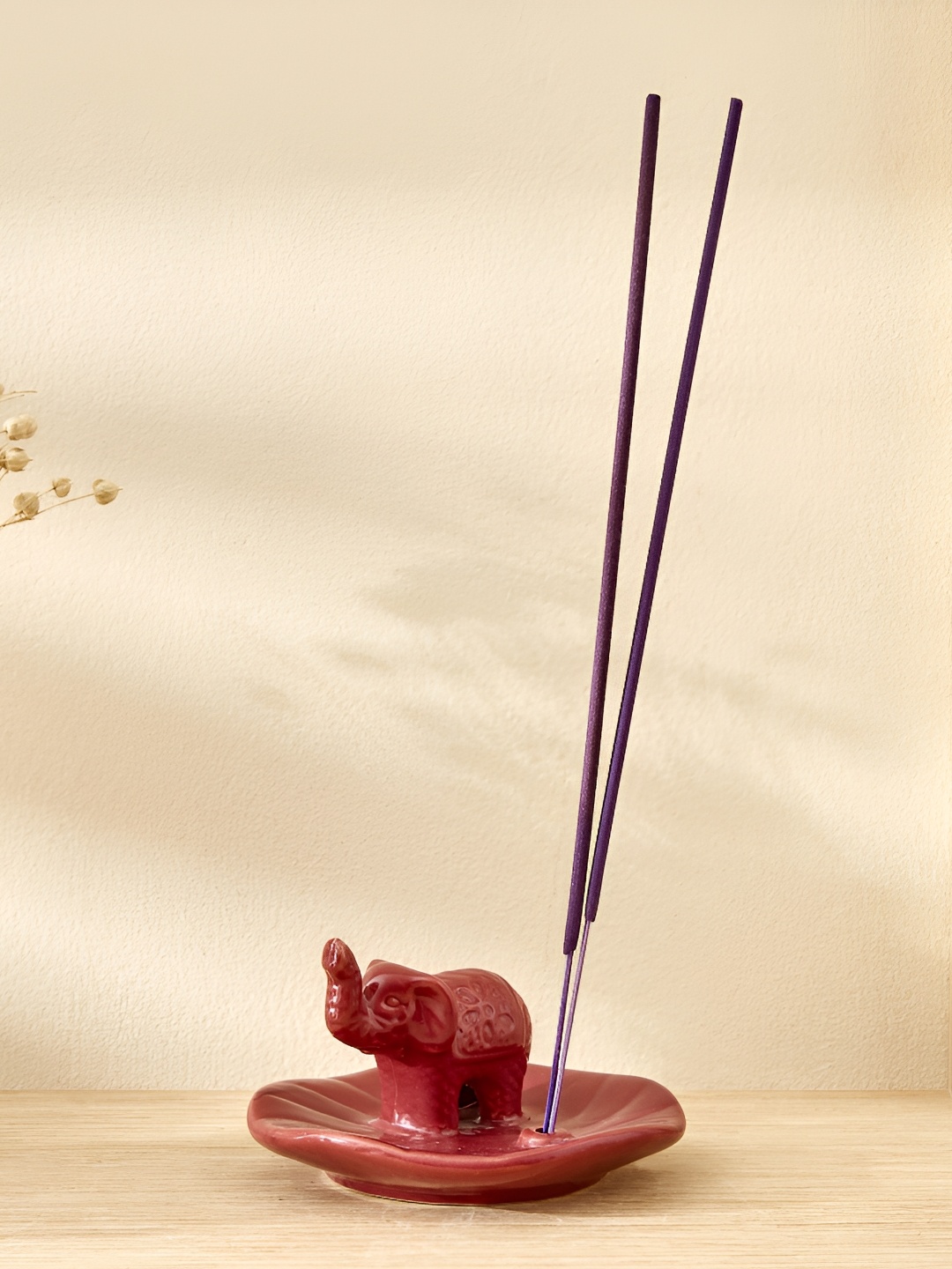 

Home Centre Red Glossy Garnet Serene Elephant Ceramic Incense Stick Holder
