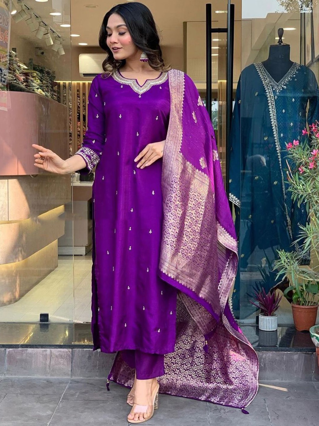 

Moda Rapido Floral Embroidered Sequinned Raw Silk Straight Kurta With Trousers & Dupatta, Purple