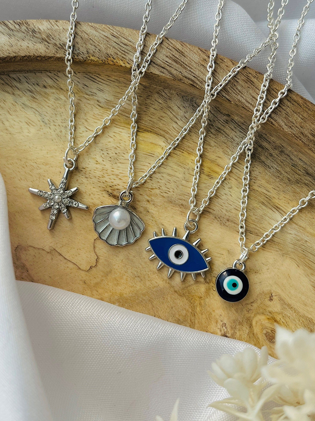 

Jewelsbysirani Korean Set Of 4 Silver-Plated Artificial Stones Studded and Beaded Pendants
