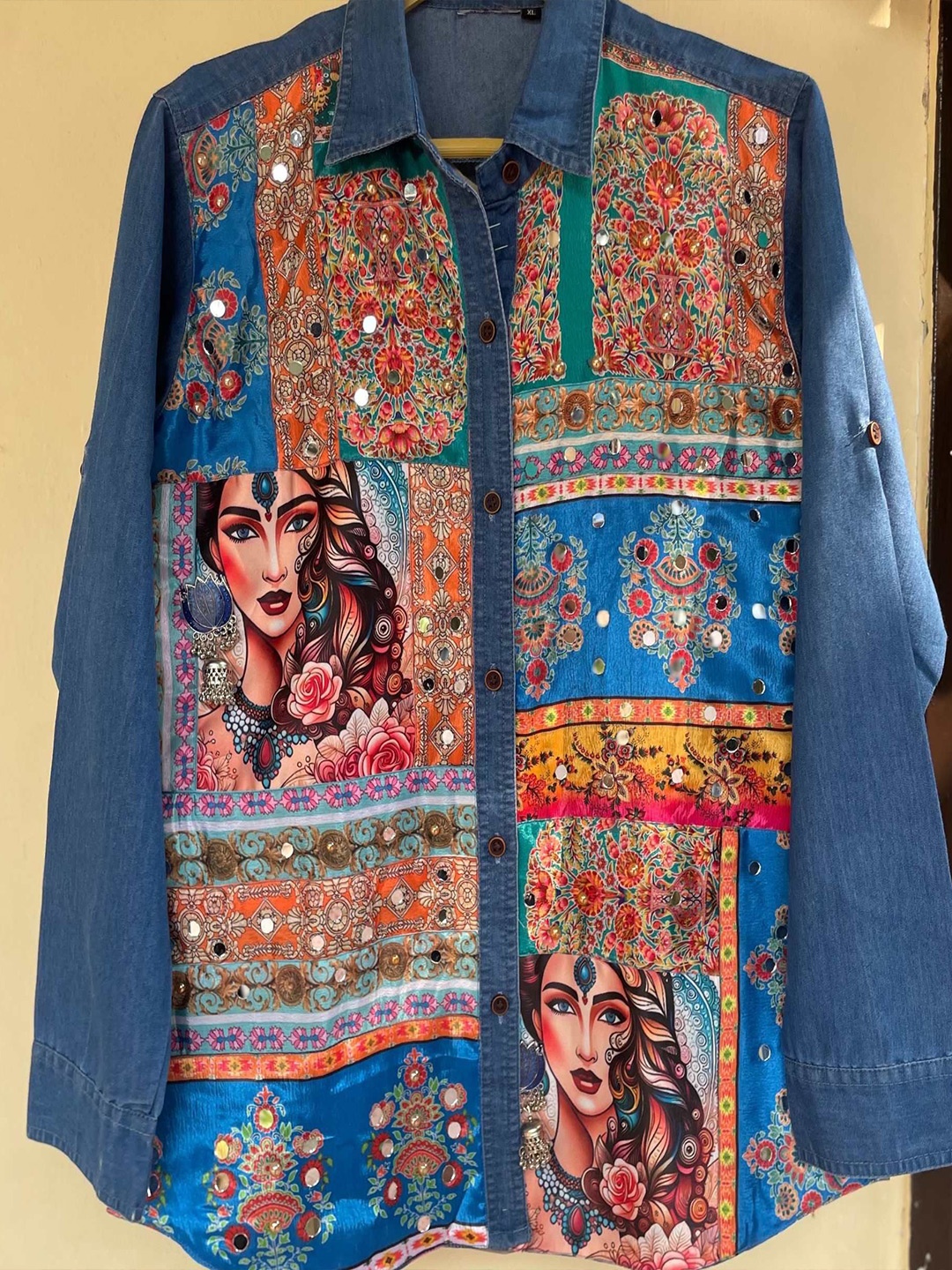 

The BANJARA TRAIL Women AMEERAHA Spread Collar Ethnic Motifs Printed Denim Casual Shirt, Blue