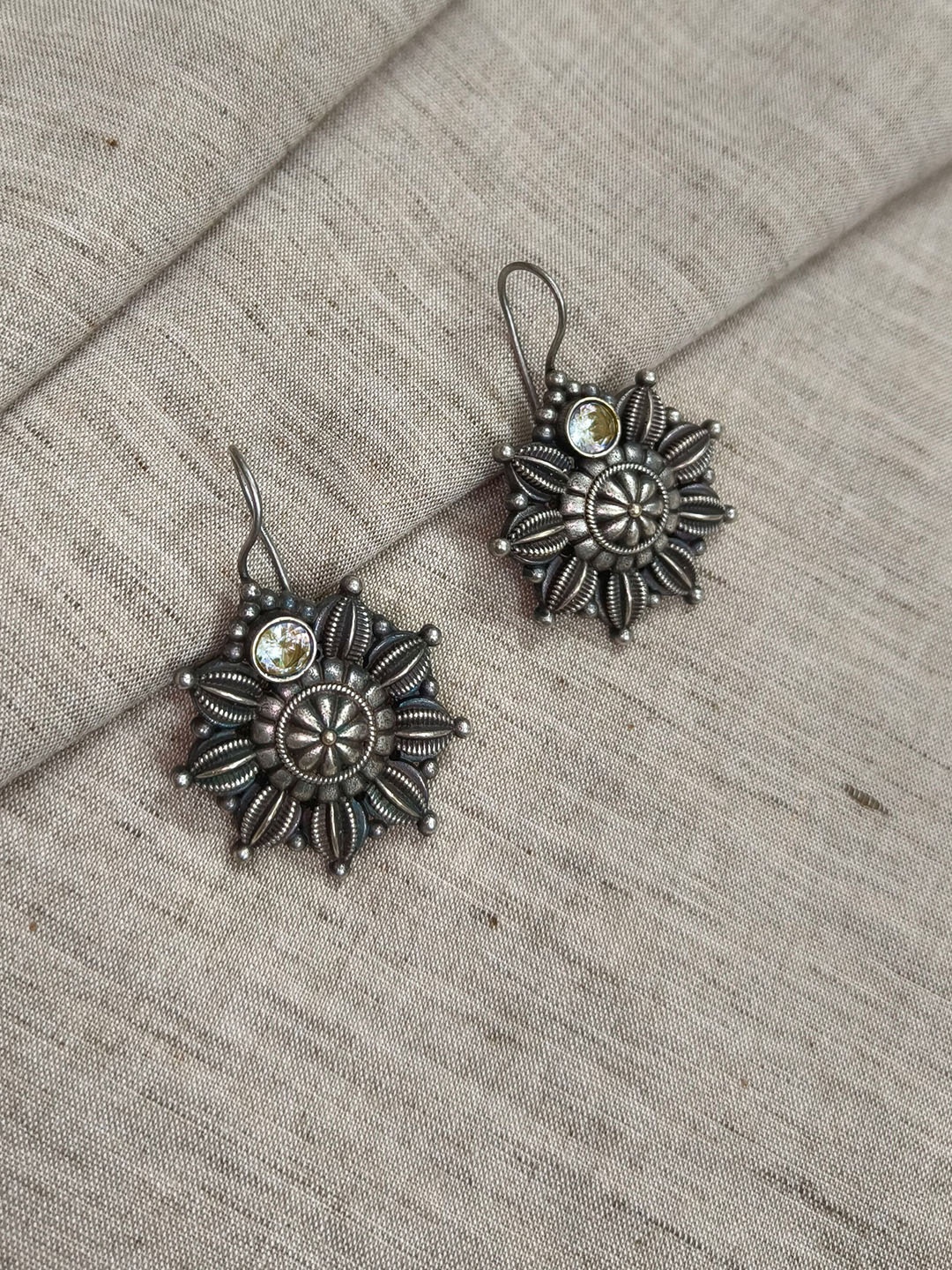 

Molcha Artificial Stones Studded Floral Shaped Oxidised Drop Earrings, Silver