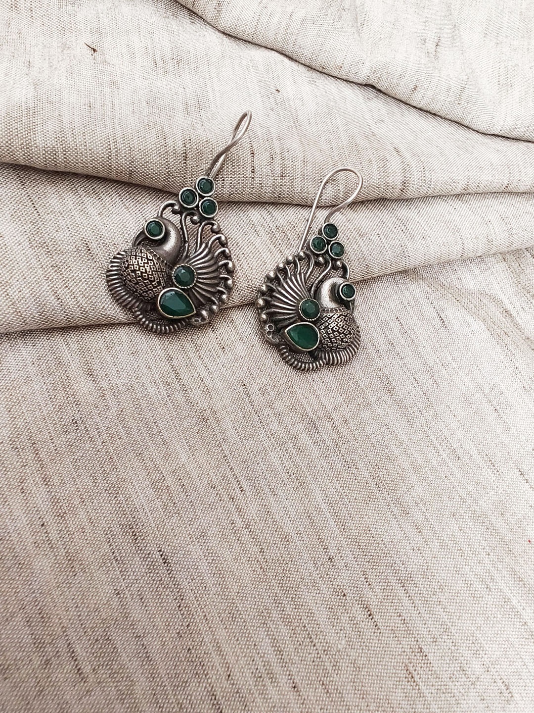 

Molcha Artificial Stones Studded Peacock Shaped Oxidised Drop Earrings, Silver