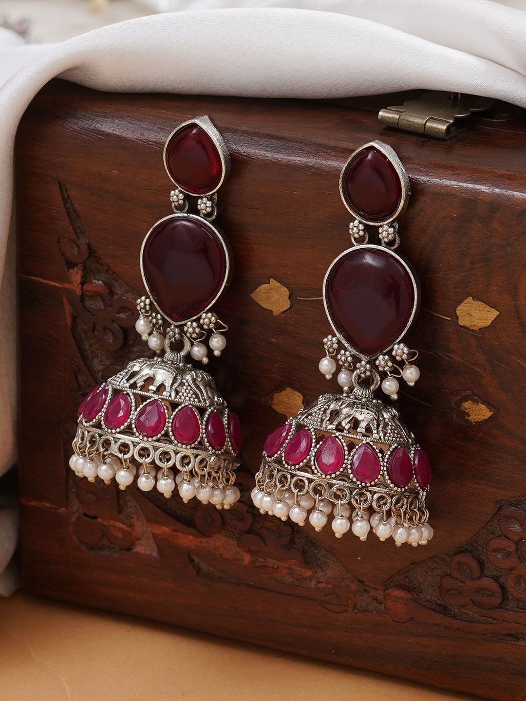 

JEWILLEY Parnika Silver-Plated Artificial Stones Studded & Beaded Oxidised Jhumkas, Red