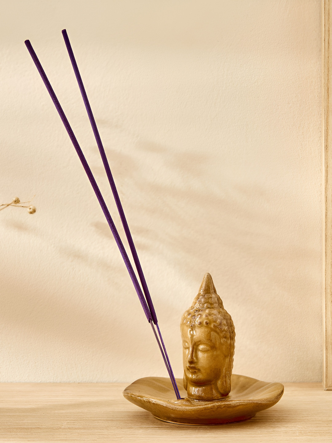 

Home Centre Yellow Glossy Garnet Serene Buddha Ceramic Incense Stick Holder