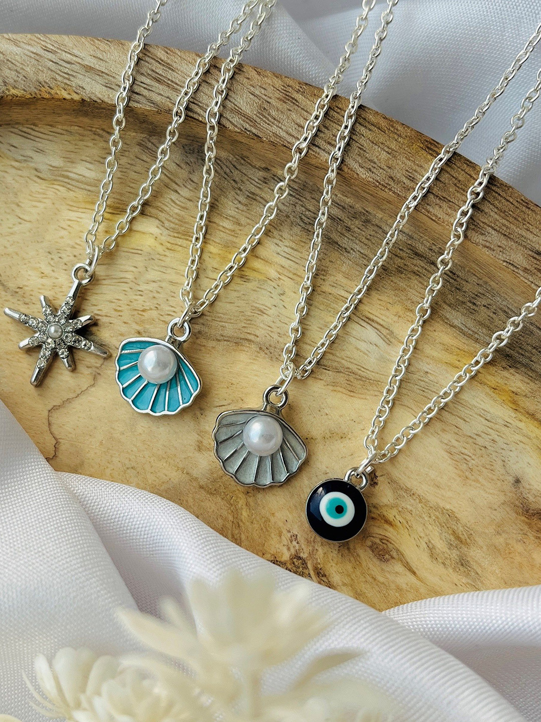 

Jewelsbysirani Korean Set Of 4 Silver-Plated Artificial Stones Studded and Beaded Pendants