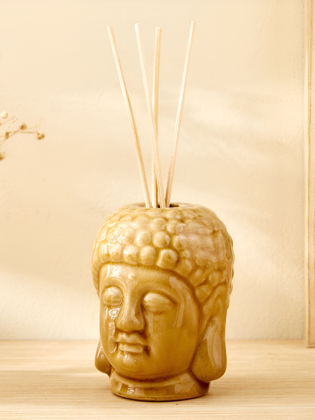 

Home Centre Yellow Glossy Divine Buddha Ceramic Aroma Oil Diffuser