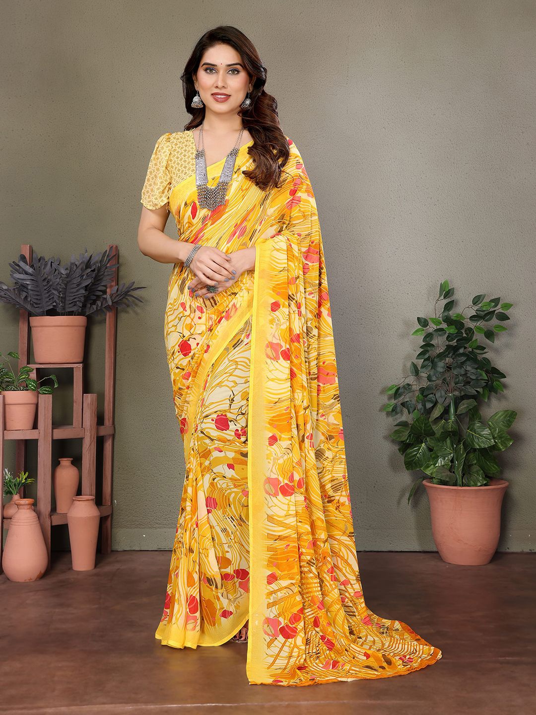 

Moda Rapido Ethnic Motifs Saree, Yellow