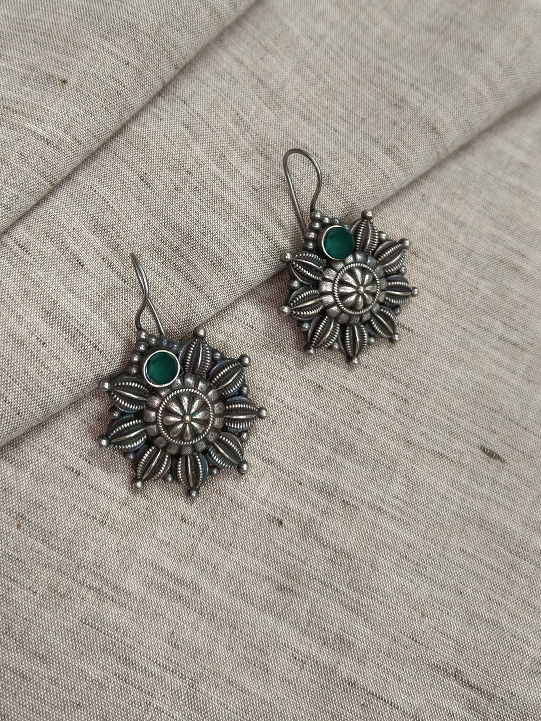 

Molcha Artificial Stones Studded Floral Shaped Oxidised Drop Earrings, Silver