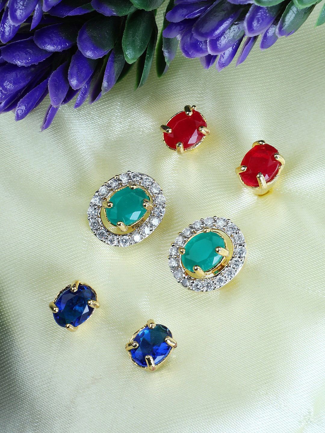 

Anouk Gold-Plated American Diamond Studded Oval Shaped Studs, Red