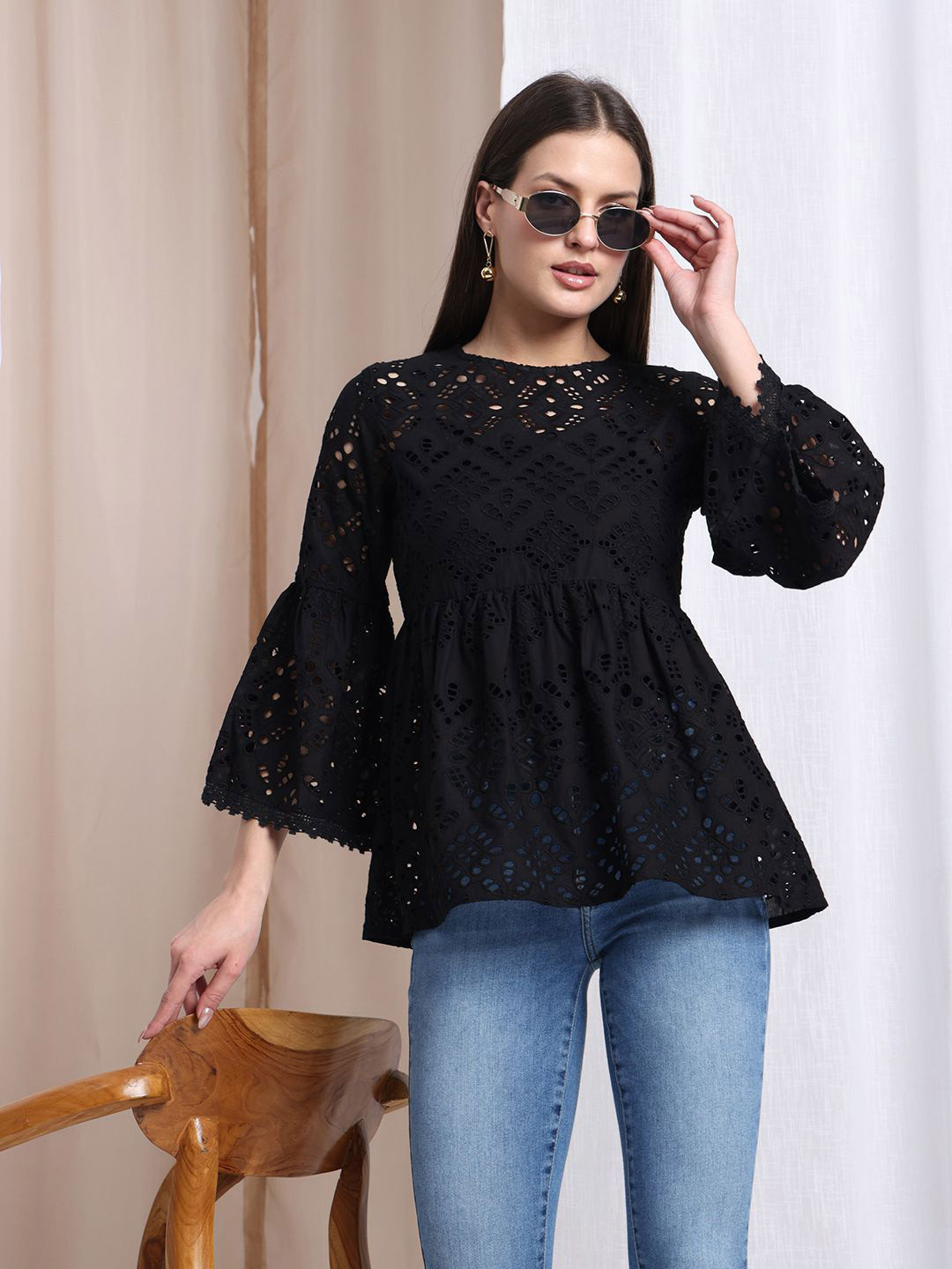 

DRESOUL Women Self Design Round Neck CottonPeplum Top, Black