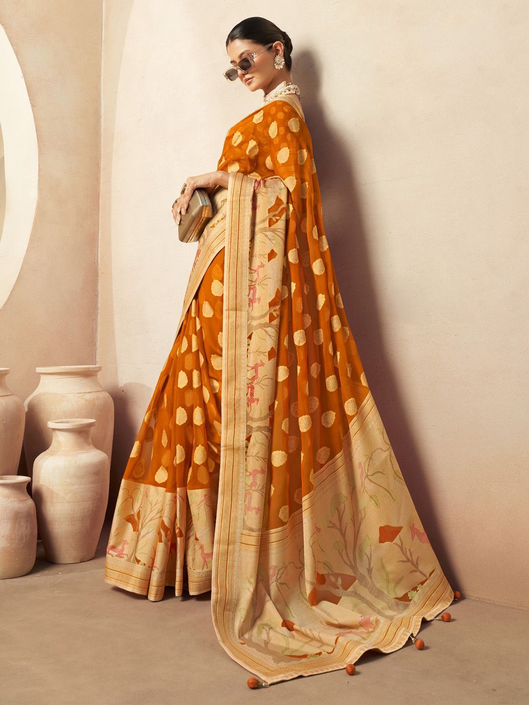 

Anouk Ethnic Motifs Zari Poly Georgette Saree, Orange