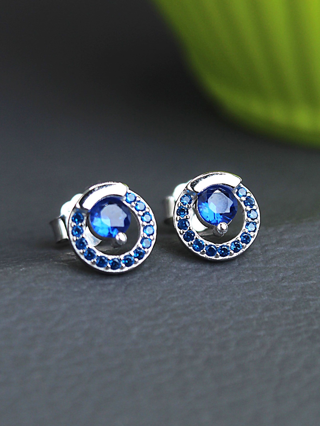 

DEVASHREE 925 Silver Rhodium-Plated Sapphire CZ Studded Circular Shaped Studs, Blue