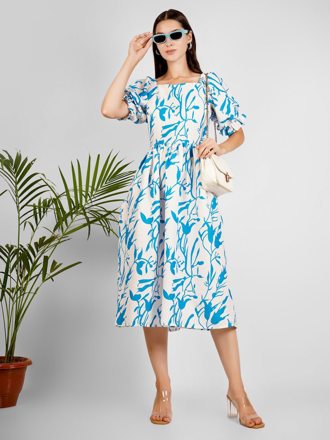 

Milastru Lycra Women Abstract Printed Fit & Flare Midi Dress, White