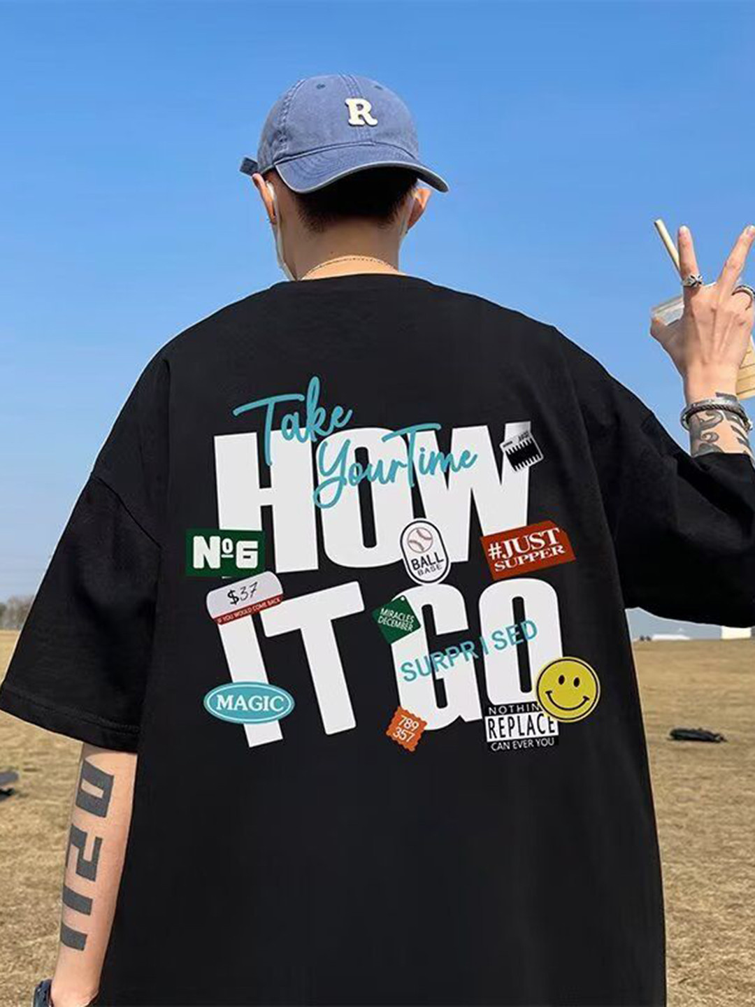 

HERE&NOW Men Typography Printed Round Neck Cotton Oversized T-shirt, Black