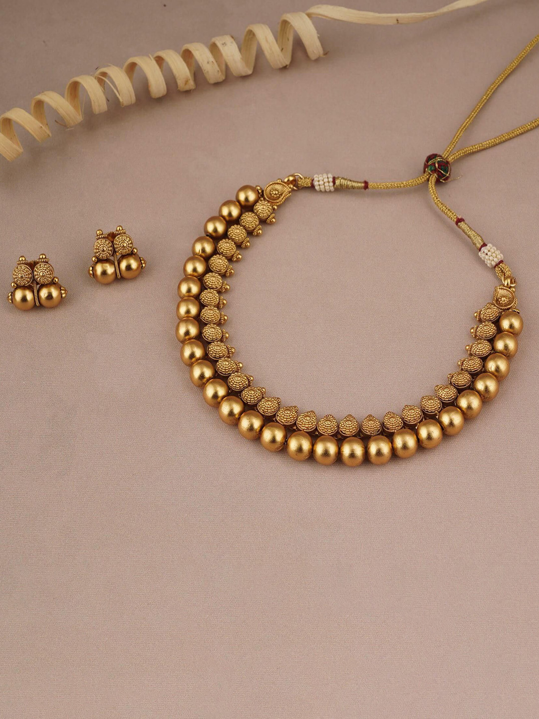 

Rangrozo Jewellery Gold Plated Textured & Beaded Traditional Jewellery Set