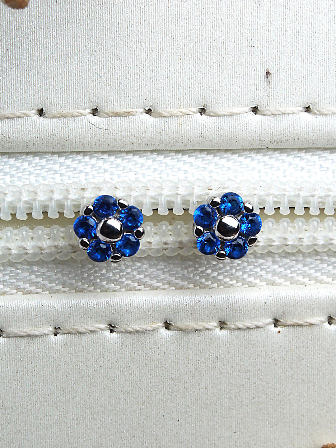 

DEVASHREE 925 Sterling Silver Rhodium-Plated CZ Studded Floral Shaped Studs, Blue