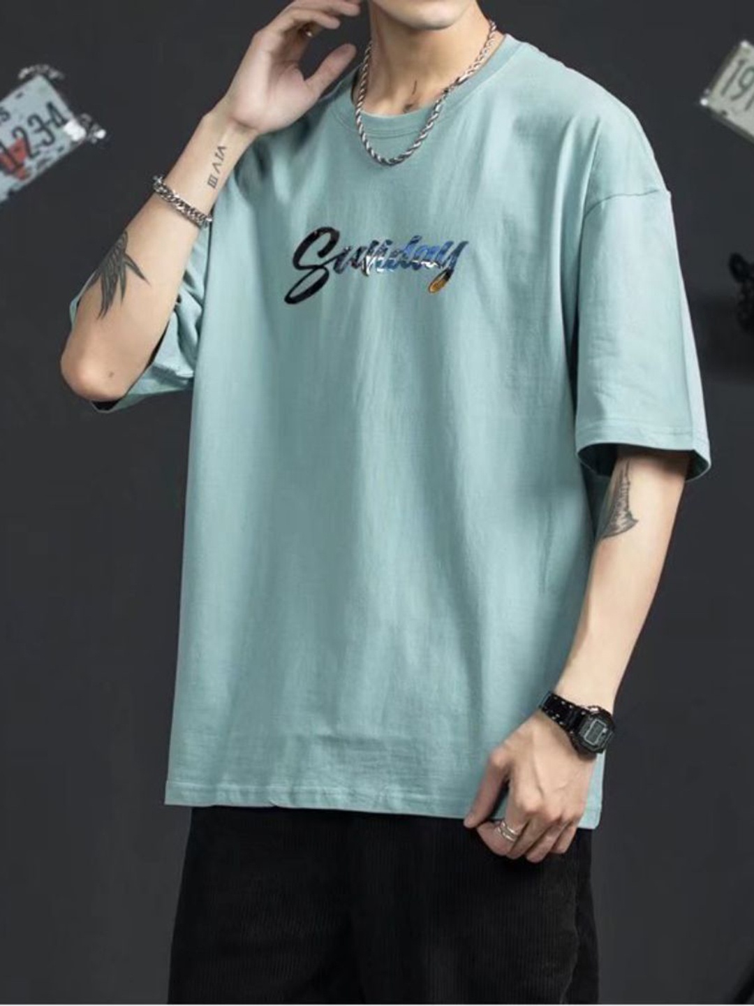 

StyleCast Men Graphic Printed Round Neck Cotton Oversized T-shirt, Green