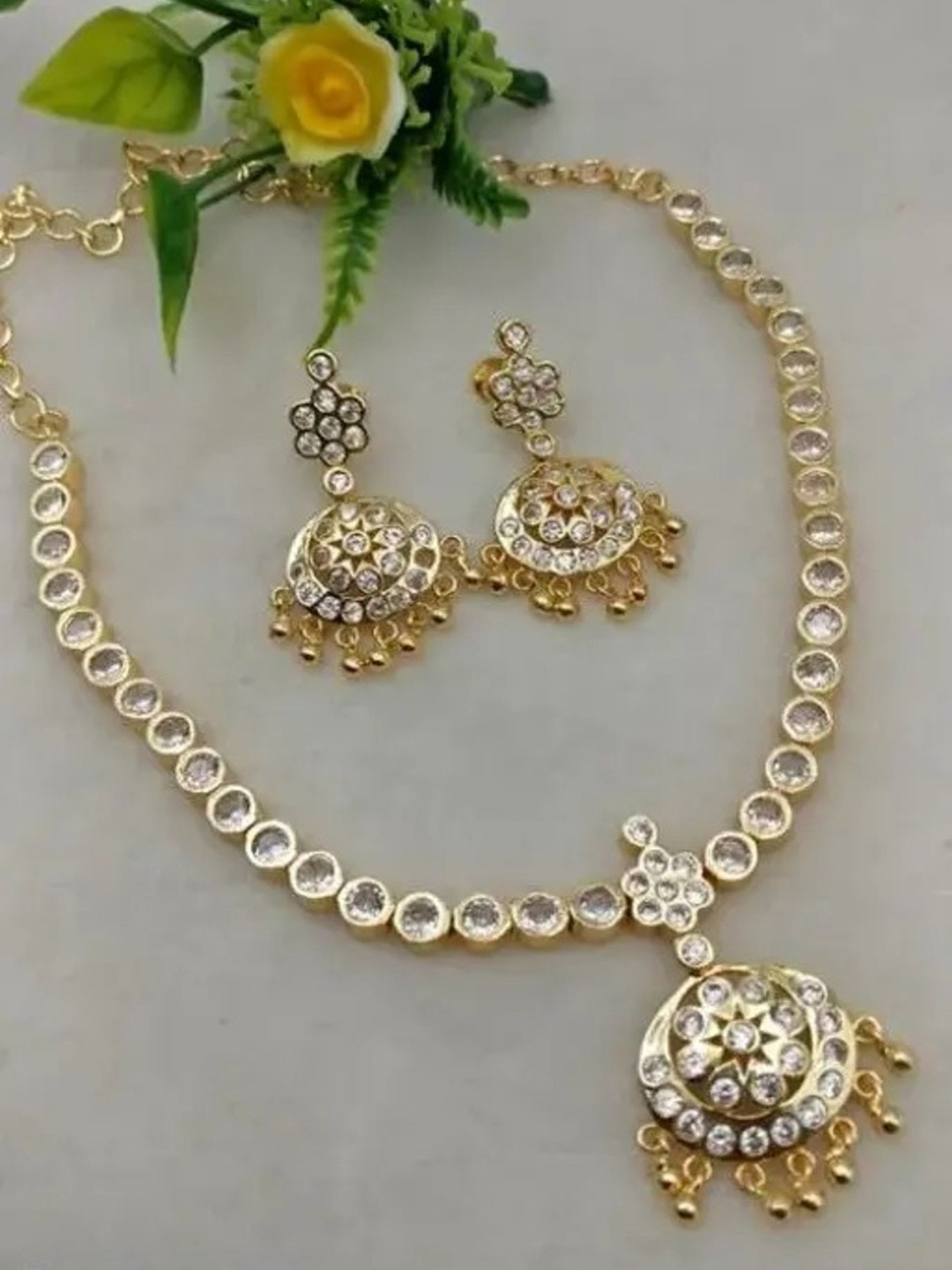 

Rangrozo Jewellery Gold Plated Stones Studded & Beaded Jewellery Set
