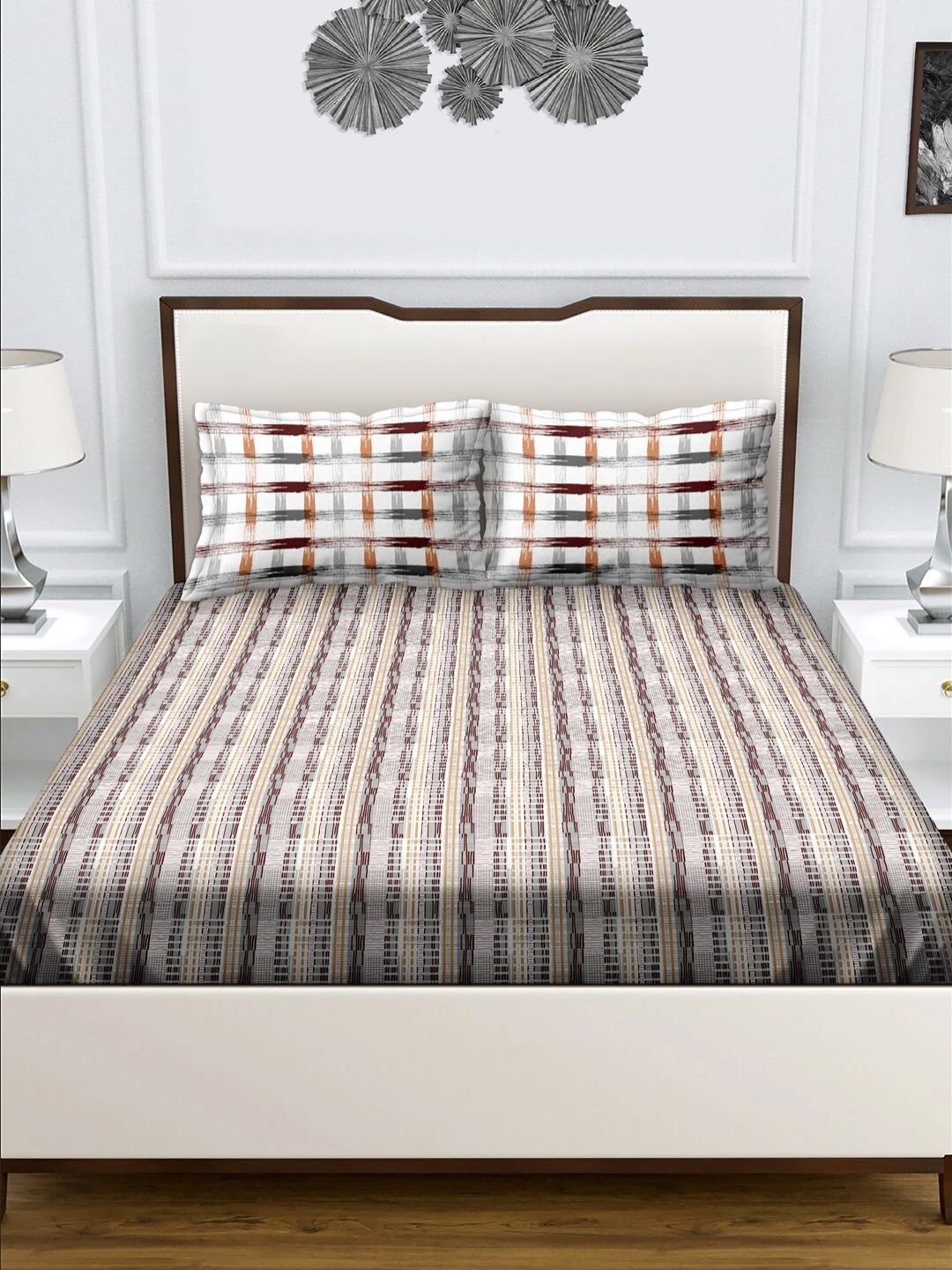 

Myntra Elegant Homes Brown & White Ethnic Motifs 180 TC Queen Bedsheet Set