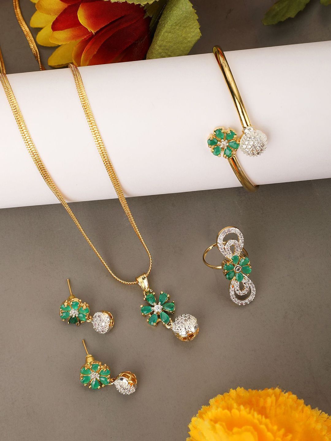 

Anouk Gold Plated American Diamond Studded Pendant Earrings Bracelet and Ring
