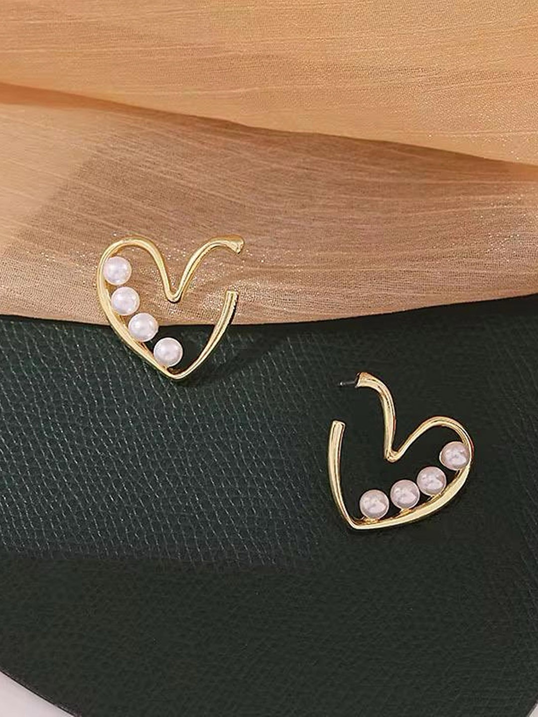 

TANLOOMS Set Of 2 Gold-Plated Artificial Stones Studded Contemporary Studs