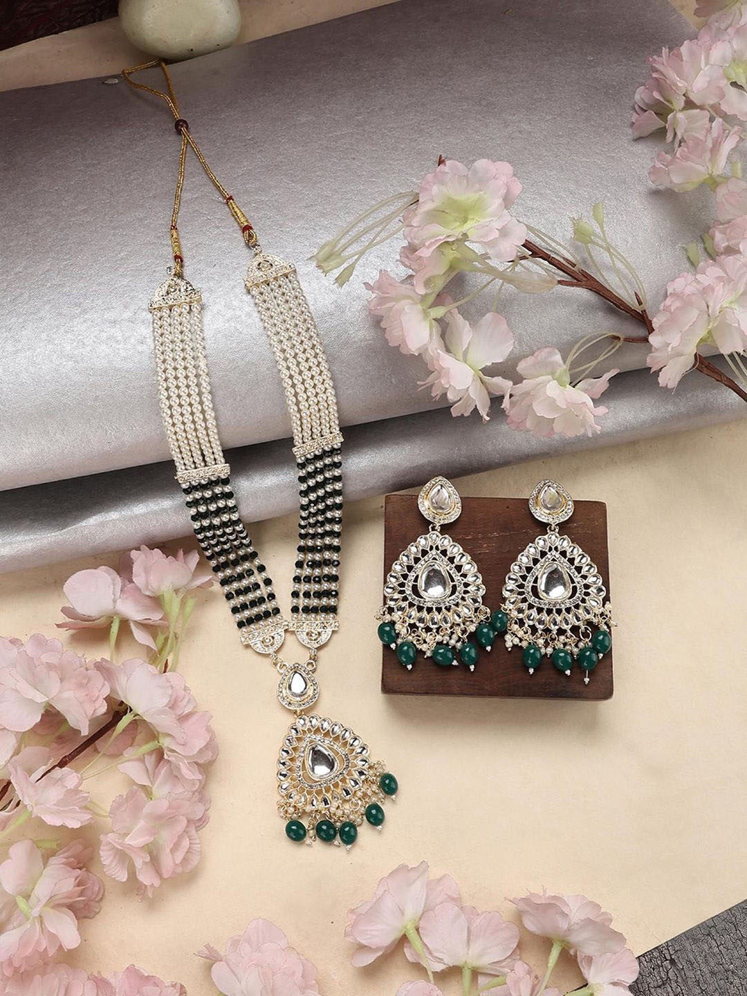 

Anouk Gold-Plated Kundan Stone Studded And Beaded Necklace and Earrings