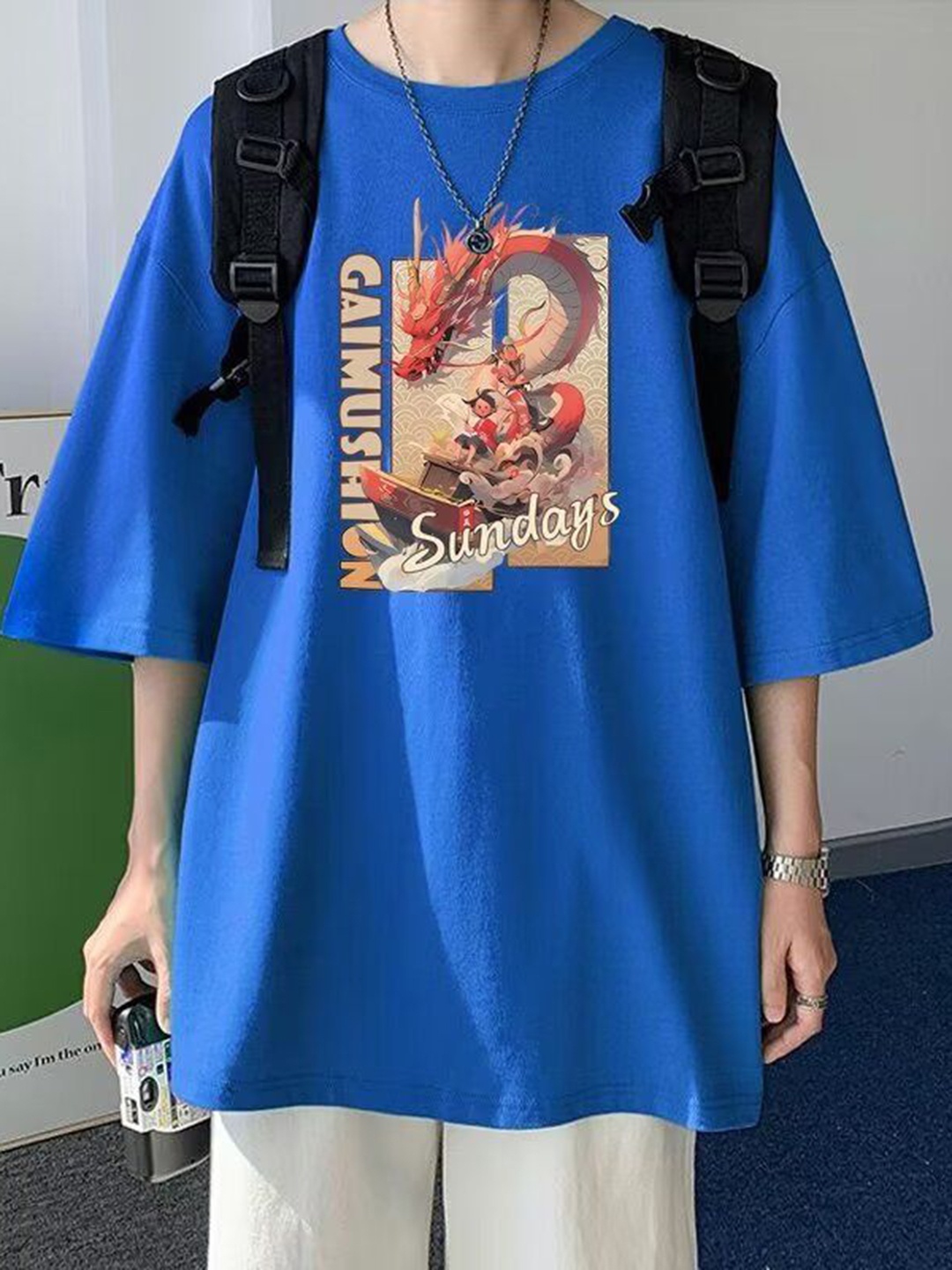 

HERE&NOW Men Graphic Printed Round Neck Cotton Oversized T-shirt, Blue