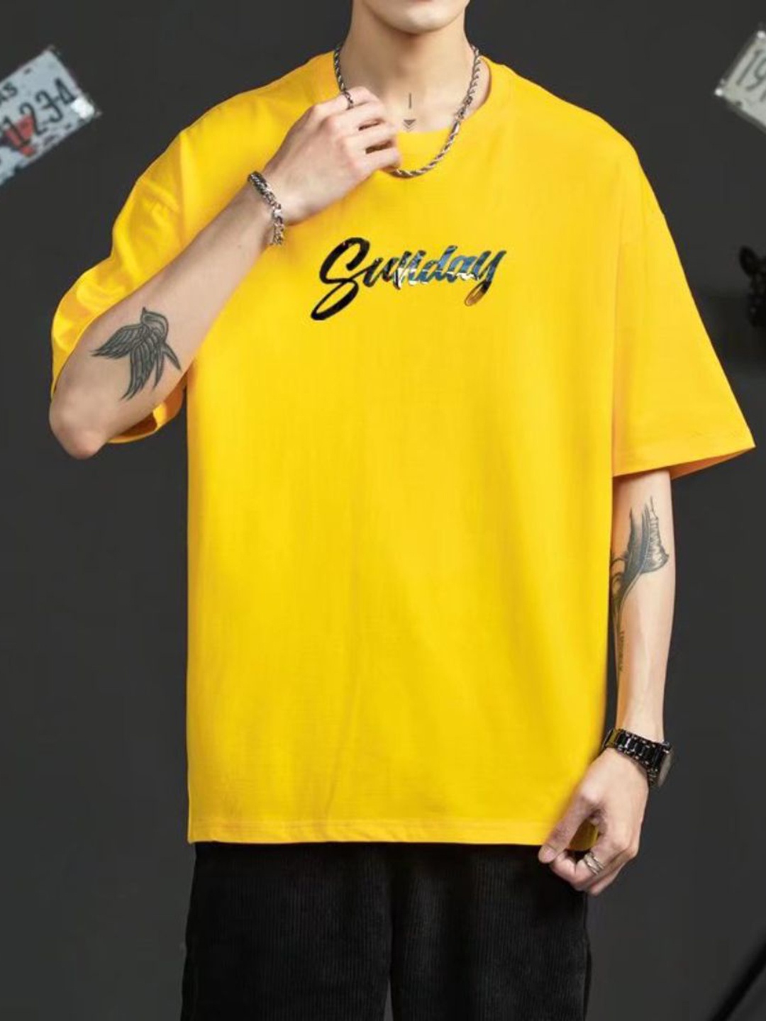 

StyleCast Men Graphic Printed Round Neck Cotton Oversized T-shirt, Yellow