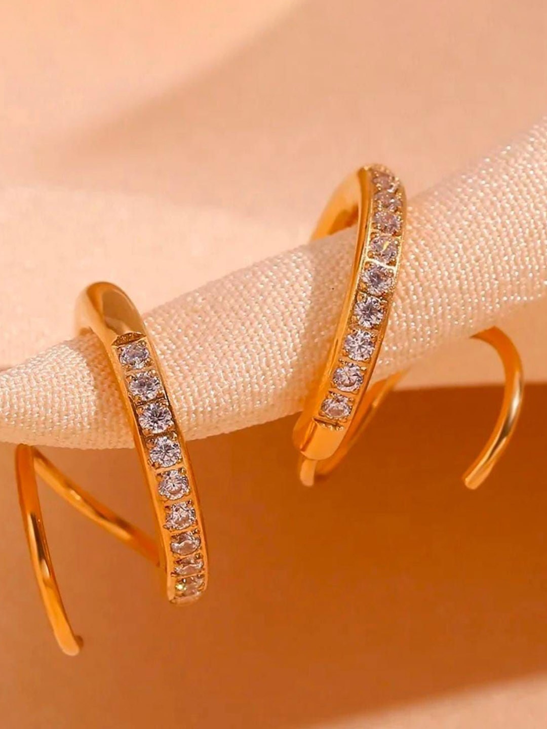

ANJNI CREATION Gold-Plated Cubic Zirconia Studded Contemporary Shaped Ear Cuffs