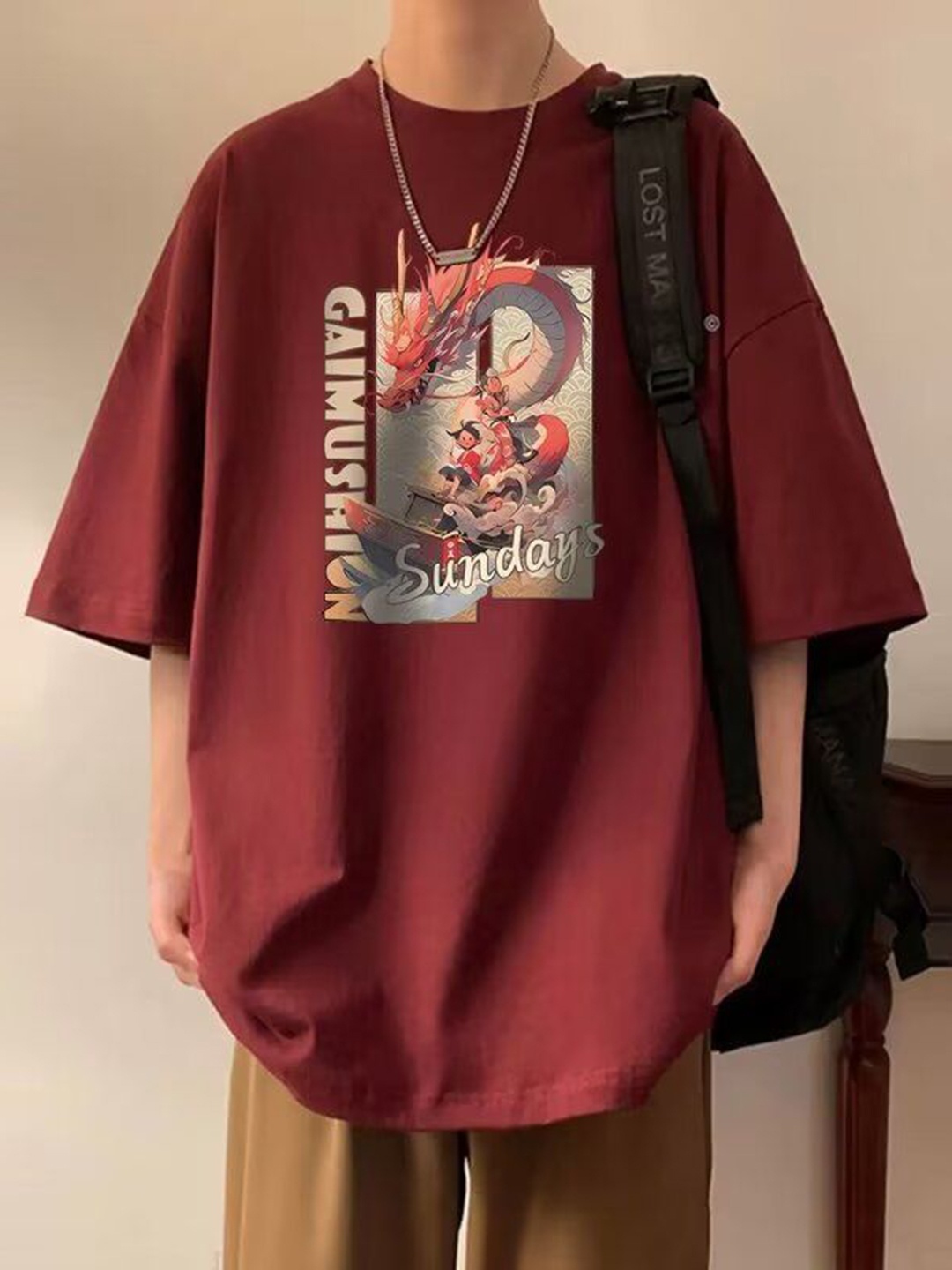 

HERE&NOW Men Graphic Printed Round Neck Cotton Oversized T-shirt, Maroon