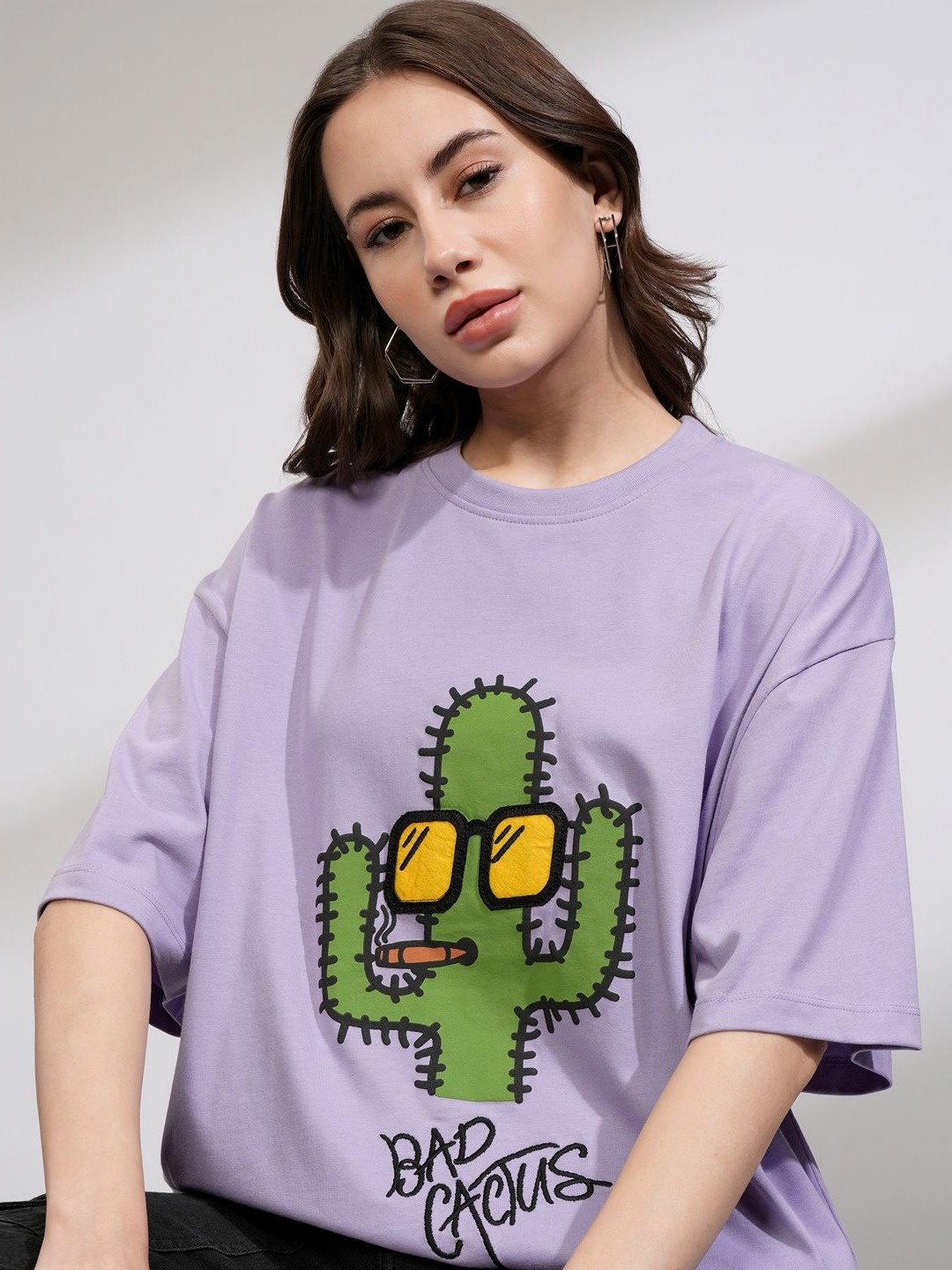 

Tokyo Talkies Women Solid Oversize Fit Chest And Back Print Tshirt, Purple