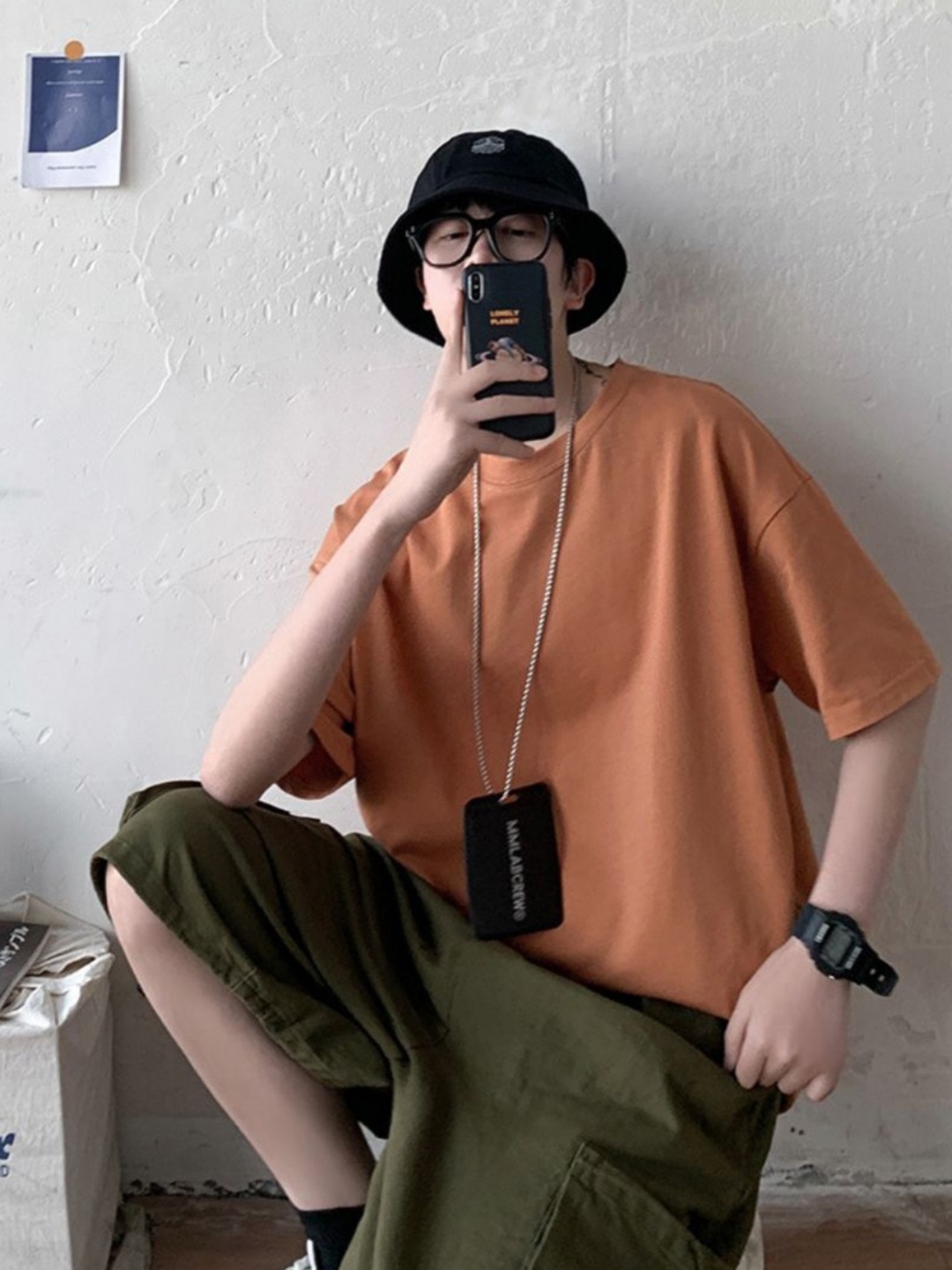 

StyleCast Men Solid Round Neck Oversized T-shirt, Orange