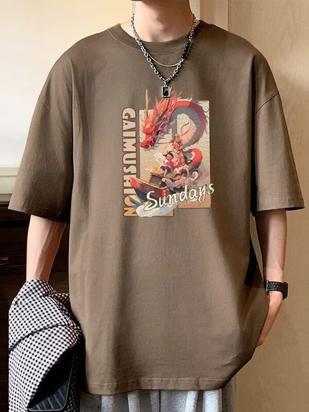

HERE&NOW Men Graphic Printed Round Neck Cotton Oversized T-shirt, Brown