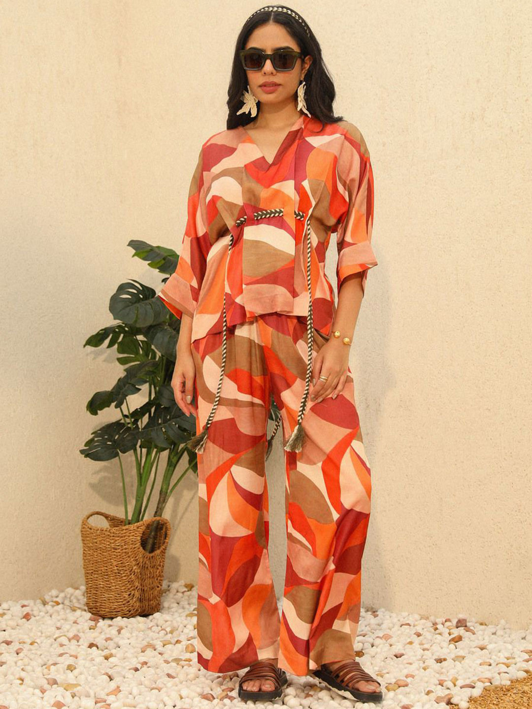 

YA-SA Women Printed Relaxed Flared High-Rise Trousers, Orange