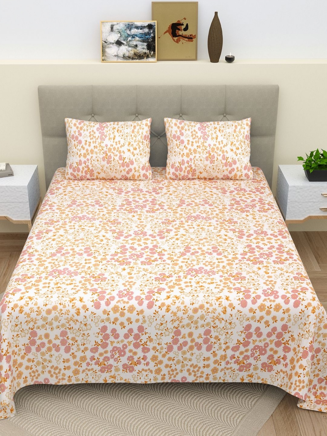 

Myntra Elegant Homes Pink & Orange Printed Cotton 180 TC King Bedsheet Set 2.43m x 2.64m