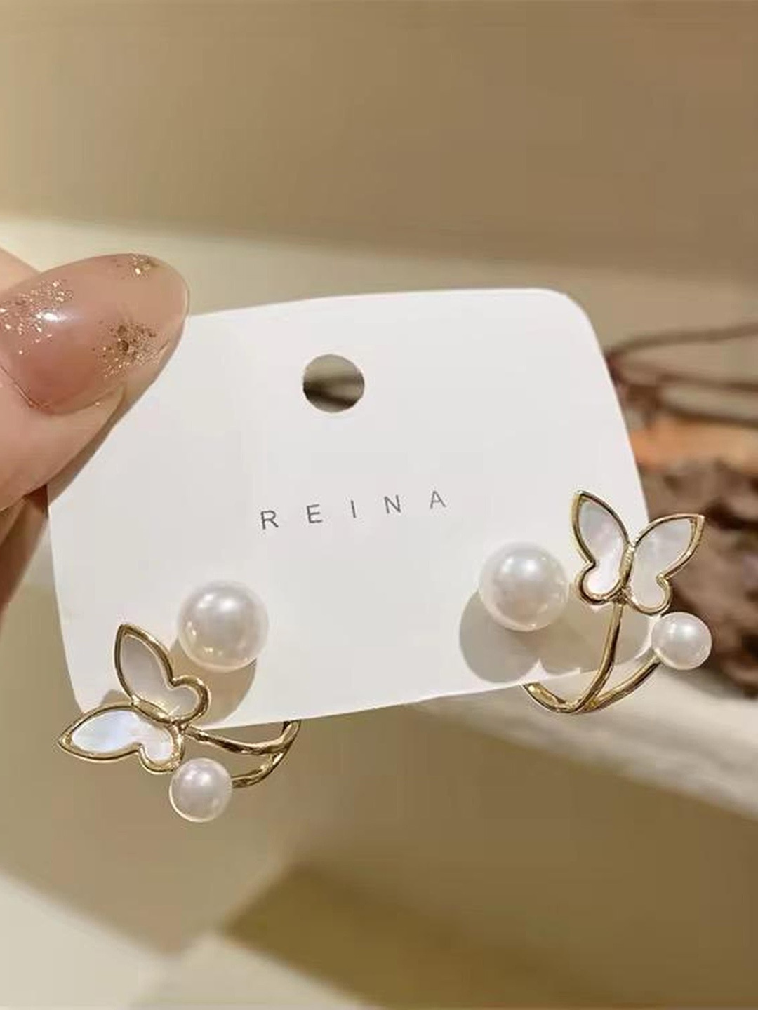 

TANLOOMS Gold-Plated Artificial Stones Studded Contemporary Studs