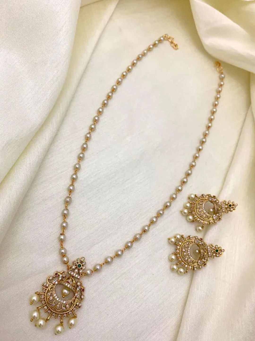 

Rangrozo Jewellery Gold Plated Stones Studded & Beaded Jewellery Set