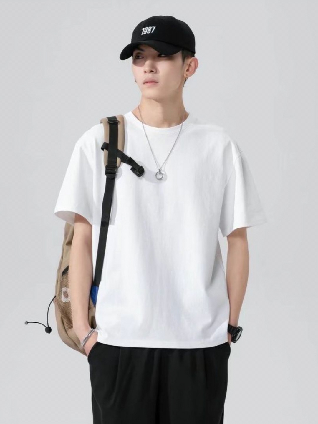 

StyleCast Men Solid Round Neck Cotton Oversized T-shirt, White