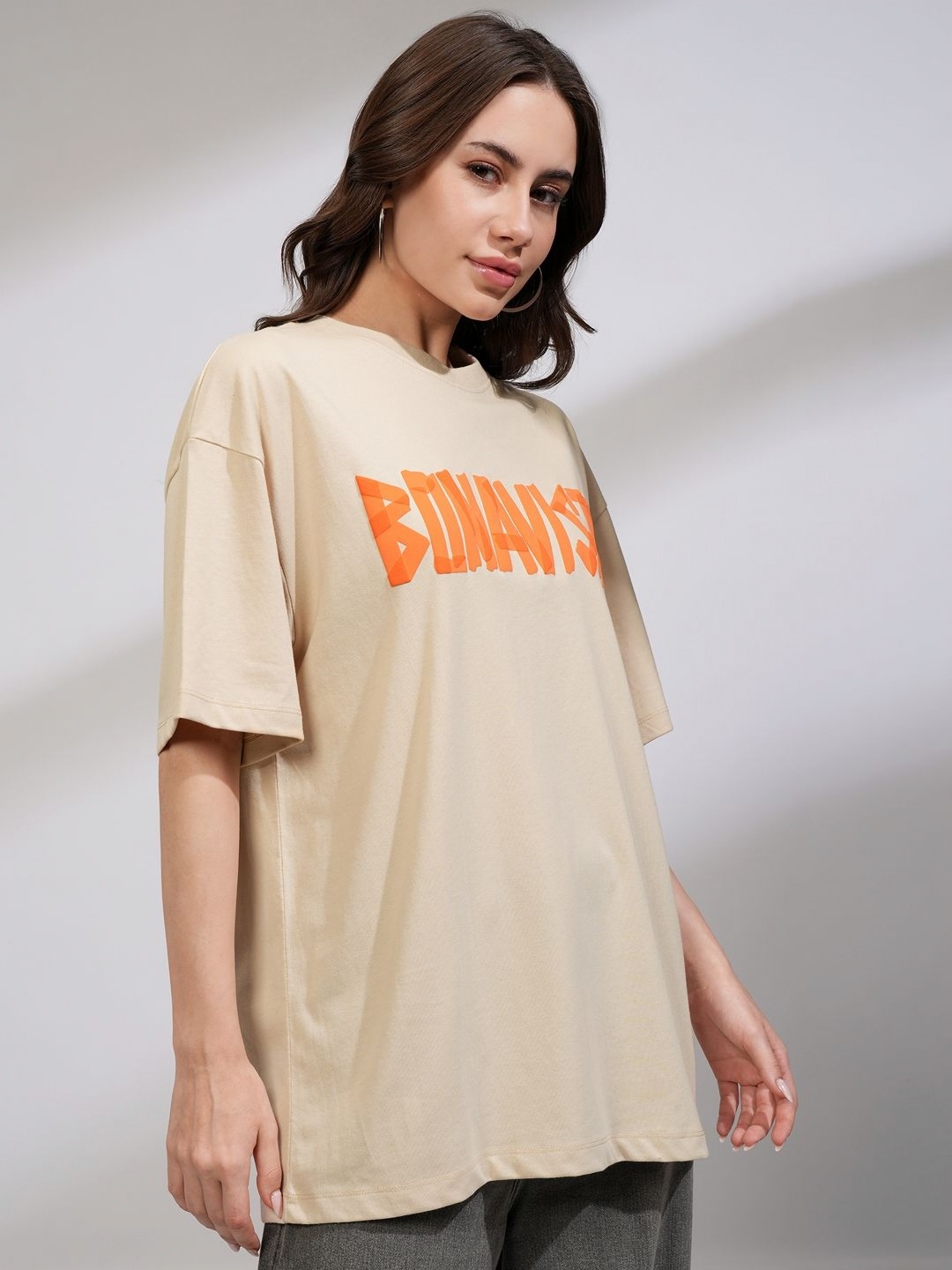 

Tokyo Talkies Women Solid Oversized Chest Print T-shirt, Beige