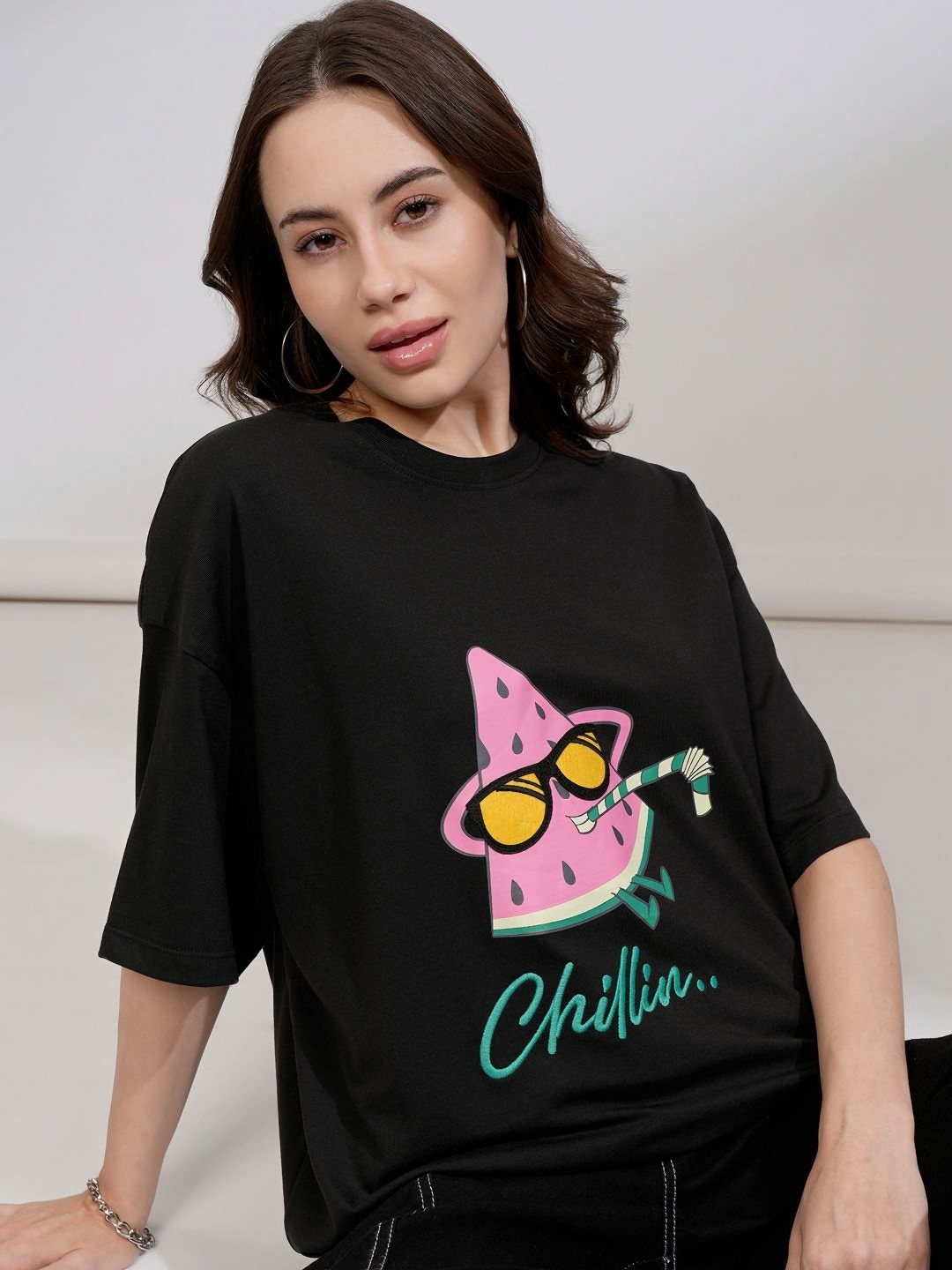 

Tokyo Talkies Women Solid Oversize Fit Chest and Back Print T-Shirt, Black