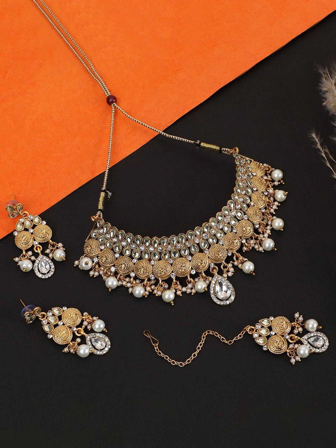 

Anouk Gold-Toned Artificial Stones Studded And Pearls Beaded Jewellery Set
